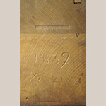 Fig. 36: Detail of John C. Burgner’s tool stamp and inscribed date on the top of the right post of the sideboard in Fig. 35. The marks are only visible when the top is removed.