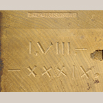 Fig. 37: Detail of John C. Burgner’s tool stamp and inscribed date on the top of the left post of the sideboard in Fig. 35. The marks are only visible when the top is removed.