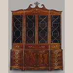 Fig. 6: Library bookcase attributed to the Martin Pfeninger Shop, 1770-1780, Charleston, SC. Mahogany and mahogany veneer with inlay of ivory and various unidentified woods and secondary woods of mahogany, cypress, and white pine; HOA: 128-3/4”, WOA: 99”, DOA: 20-1/2”. Charleston Museum Acc. HF 357. Photograph by Gavin Ashworth, NYC. MESDA Object Database file S-8000.