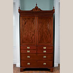 Fig. 39: Linen press with secretary and dressing drawers attributed to the partnership of Gros & Lee, 1804-1807, Charleston, SC. Mahogany and mahogany veneer with holly inlay, red cedar, tulip poplar, and white pine; HOA: 94-1/2”, WOA: 48-1/2”, DOA: 23”. Historic Charleston Foundation Acc. 2013.034.001; Purchased with funds donated by Mr. and Mrs. James P. Barrow; Photograph by Russell Buskirk. MESDA Object Database file D-32531.