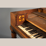 Fig. 9: Detail of the inlaid fylfot on the Prichard-Correll piano (Fig. 1).