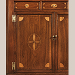 Fig. 11: Detail of drawer and lower-door inlay on the corner cupboard illustrated in Fig. 6.
