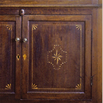 Fig. 12: Detail of lower-door inlay on the corner cupboard illustrated in Fig. 7.