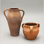 Fig. 19 Tapered jar and three-handled jar attributed to William F. James; Farmington, Davie County, NC; ca. 1870-1939. Lead-glazed earthenware (interior only); HOA 9˝ (tapered jar); HOA 4 1/2˝ (three-handled jar). Author’s collection. Photograph by the author.