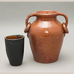 Fig. 20 Wall pocket and ring-handled jar attributed to William F. James; Farmington, Davie County, NC; ca. 1870-1939. Lead-glazed earthenware; paint; HOA 5 1/4˝ (wall pocket); HOA 9 1/4˝ (jar). Author’s collection. Photograph by the author. James was unusually generous with the glaze when finishing the ring-handled jar, which is glazed inside and out.