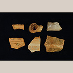 Fig. 40 Press-molded smoking pipe bowl fragments and slip-trailed decorated sherds by an unknown maker; Huntsville, Yadkin County, NC; ca. nineteenth century. Earthenware, unglazed and lead-glazed with slip-trailing. Private collection. Photograph by the author.