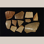 Fig. 42 Glazed sherds by an unknown maker; Huntsville, Yadkin County, NC; ca. nineteenth century. Salt-glazed stoneware. Private collection. Photograph by the author. The presence of stoneware sherds suggests, but does not prove, that earthenware and stoneware were produced at the Huntsville site.