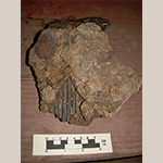 Fig. 45 Kiln tile by an unknown maker; Jamestown, Guilford County, NC; ca. nineteenth century. Unglazed earthenware. Private collection. Photo courtesy of Hal E. Pugh. This kiln tile’s narrow grooves and thinness make it similar to the examples from Yadkin and Davie counties seen in figures 43 and 44 and figure 46 from a Greene County, TN site associated with Silas Vestal. A sherd recovered at this Guilford County location bears the partially inscribed name Vestal, see Fig. 8.