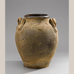 Fig. 53 Storage jar by an unknown maker; Piedmont Region, possibly Yadkin County, NC; ca. nineteenth century. Lead-glazed earthenware (interior and rim). Private collection. Photo courtesy of Old Salem Museums & Gardens. This jar’s similarity in form, including the style of its handles, suggests a connection to the maker of the jar in figure 51.