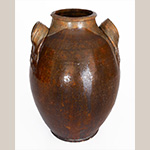Fig. 54 Storage jar by John Alexander Lowe; Greene County, TN; ca. 1852-1862. Lead-glazed earthenware; HOA 13 5/8˝. Private collection; Ex. Carole Wahler Collection. Photo courtesy of Crocker Farm Auction. Lowe probably knew, and perhaps made pottery with, former Yadkin County, NC, potter Simon Bohannon. This jar bears Lowe’s name and is similar in form to the North Carolina jars seen in Figures 51 and 53.