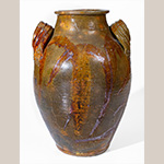Fig. 55 Storage jar by Christopher Alexander Haun; Greene County, TN; ca. 1840-1860. Lead-glazed earthenware; HOA 13˝. Private Collection; Ex. Carole Wahler Collection. Photo courtesy of Crocker Farm Auction. Like Lowe’s jar in Figure 54, this jar, made by C. A. Haun, shares traits with the North Carolina jars in Figures 51 and 53.