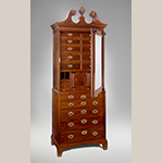 Fig. 25: Cabinet on chest (or lady’s closet) attributed to Robert Deans and Henry Burnett (carver), 1750–1755, Charleston, South Carolina. Mahogany with cypress; HOA: 53-1/4”, WOA: 35-1/4”, DOA: 18-3/4”. Collection of the Museum of Early Southern Decorative Arts (MESDA), given in memory of Polly and Frank Meyers by Mr. and Mrs. George Kaufman, Acc. 4215.