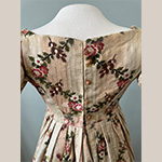 Fig. 7 Rear view of the dress illustrated in Figure 5, detailing the fabric covered buttons that were likely created for the dress’s upcycling in 1825. Photograph by Howard Sutcliffe, River Region Costume and Textile Conservation.