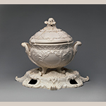 Fig. 27: Tureen with cover and plateau, Pont-aux-Choux, 1755–1765, Paris, France. Tin-glazed earthenware; HOA: 15-7/8”, WOA: 14-5/8”, DOA: 12”. Metropolitan Museum of Art, Acc. 50.211.86a-c. Gift of R. Thornton Wilson in memory of Florence Ellsworth Wilson.