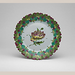 Fig. 28: Plate, 1765–1770, France. Tin-glazed earthenware; DIA: 9-1/8”. Metropolitan Museum of Art, Acc. 17.190.1923. Gift of J. Pierpont Morgan.