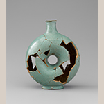 Fig. 30: Ring bottle fragment, shop of Rudolph Christ, 1793–1800, Salem, NC. Tin-glazed earthenware; HOA: 7”, WOA: 5-3/4”. Old Salem Museums & Gardens, archaeology collection. MESDA Object Database file S-1947. Photograph by Gavin Ashworth.