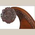 Fig. 18: Detail of carved rosettes on the secretary wardrobe illustrated in Fig. 1. Photograph courtesy of Brunk Auctions, Asheville, NC.