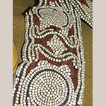 Fig. 24: Detail of beaded strap illustrated in Fig. 23.