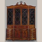Fig. 1: Library bookcase attributed to the Martin Pfeninger Shop, 1770-1780, Charleston, SC. Mahogany and mahogany veneer with inlay of ivory and various unidentified woods and secondary woods of mahogany, cypress, and white pine; HOA: 128-3/4”, WOA: 99”, DOA: 20-1/2”. Charleston Museum Acc. HF 357. Photograph by Gavin Ashworth, NYC.