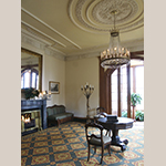 Fig. 19: Blandwood interior, west parlor frieze and center ceiling medallion with Classical anthemion motifs in plasterwork. Courtesy of Preservation Greensboro; Photograph by Scott Crowder.