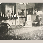 Fig. 31: Photograph of Blandwood's west parlor, 1880s, taken during the time daughter Emma Victoria Morehead Gray occupied the mansion; the photo shows the paintings “Youth” and “Manhood” by William C. A. Frerichs hanging on the walls. Collection of Preservation Greensboro, Blandwood Archives.