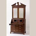 Fig. 39: Desk and bookcase with carving attributed to Henry Burnett, 1750–1755, Charleston, SC. Mahogany with cypress; HOA: 98-1/2”, WOA: 44-1/2”, DOA: 24-1/4”. Collection of the Museum of Early Southern Decorative Arts (MESDA), Acc. 845, Gift of Frank L. Horton.