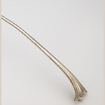 Fig. 5 Detail of the “S/B M” monogram on the ladle illustrated in Figure 3. The monogram, though worn and difficult to read, is present on the shaft of the ladle. The “M” for Martha is just visible where the scroll transitions to the smooth shaft.