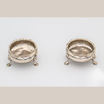 Fig. 9 Pair of silver salt cellars by Elizabeth Muns; London, England; 1768/69. (left) HOA 1 ¼”, WOA 2 ¾”, DOA 2 ¼”; (right) HOA 1 3/8”, WOA 2 ¾”, DOA 2 ¼”. Courtesy of the Thomas Jefferson Foundation at Monticello, photograph by Ian Atkins, acc. 1978-32-1/2. Of the four silver salt cellars listed on the Skelton estate record, two survive, although their glass inserts are now missing.