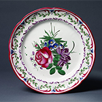 Fig. 4: Example of French tin-glazed plate by Les Islettes pottery factory, c. 1800-1820, France. Tin-glazed earthenware; Victoria and Albert Museum, C.298-1951.