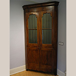 Fig. 1 Corner Cupboard signed by Thomas S. Doron; Montgomery, AL; 1852. Mahogany, mahogany veneers, cypress, poplar, yellow pine; HOA: 100-¼"; WOA: 52"; DOA: 24-½". Courtesy of Burritt on the Mountain, 2001.36.