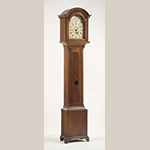 Fig. 44: Tall case clock with case by Henry Macy, 1800–1820, Guilford Co., NC. This is the only known clock case attributed to the Macy shop with a decoratively lobed front glass; some of Macy’s clock cases also feature small drawers at the bottom of the case. Walnut with tulip poplar; HOA: 91-1/4”, WOA 20-1/4”, DOA 11-3/4”. MESDA Collection, Acc. 5320; Promised gift of Mr. and Mrs. Lee French, Mr. and Mrs. Spencer Morten, and Dr. and Mrs. William Bell.