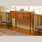 Fig. 47: Sideboard by Henry Macy, 1800–1820, Guilford Co., NC. Descended in the Henry Macy family. Walnut with tulip poplar; HOA: 45”, WOA: 49-1/4”, DOA: 20-5/16”. Private Collection; MESDA Object Database file D-31851.