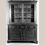 Fig. 26: Side cupboard attributed to Jacob Clodfelter, ca. 1800, Davidson Co., NC. Walnut with walnut and yellow pine; HOA: 84-3/8", WOA: 59-1/2", DOA: 19-3/8" (from upper molding of lower case to back). Private collection. MESDA Object Database file S-11542.