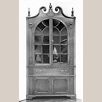 Fig. 54: Corner cupboard attributed to Mordecai Collins and possibly Jacob Clodfelter, ca. 1810, Davidson Co., NC. Walnut with yellow pine; HOA: 96", WOA: 40", DOA: NR. Private collection. MESDA Object Database file S-1054.