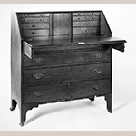 Fig. 63: Desk by John Swisegood and Jonathan Long, 1820, Davidson Co., NC. Walnut with yellow pine, tulip poplar, walnut, and light- and dark-wood inlay; HOA: 43", WOA: 40", DOA 19-1/2". Private collection. MESDA Object Database file S-1675.