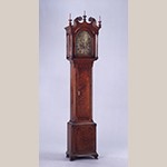 Fig. 5: Tall case clock by an unknown cabinetmaker with clockworks attributed to James Huston, 1770-1780, Augusta Co., Virginia. Walnut with yellow pine, tulip poplar, iron, brass, and steel; HOA: 98”, WOA: 22-1/4”, DOA: 12-3/4”. Collection of The Colonial Williamsburg Foundation, Acc. 1992-124-A.