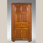 Fig. 36: Corner cupboard by Moses Crawford, 1790-1800, Knox County, Tennessee. Walnut with yellow pine, tulip poplar, and oak inlay; HOA: 87-7/8”, WOA: 49-1/2”, DOA: 18-7/8”. Private collection, MESDA Research File 32,407.