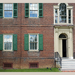 Fig. 6: Detail of Liberty Hall’s Flemish bond brickwork, belt course, and molded brick water table. Photograph by Gary Albert.