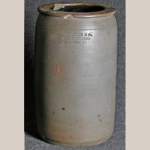 Fig. 6: Jar stamped by Anton Melcher and Company (w.1849–c.1875), Louisville, KY, 1850-1875. Stoneware; HOA: 10-1/4”, DIA: 6”. Private collection, photograph courtesy of the Speed Museum of Art.