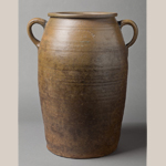 Fig. 12: Jug stamped “GRIGGS & GRINSTEAD, / WACO, K.Y.” (Lucien T. Griggs [w.1857–c.1875] and John Parker Grinstead [w.1837–c.1860] and ), Waco, KY, 1857–1875. Stoneware; HOA: 20-1/8”, HOA: 16”, DIA: 12”. Collection of the Speed Museum of Art, Acc. 2012.7.23.