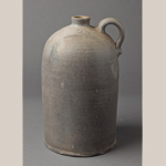 Fig. 14: Jug stamped “G. W. GRINSTEAD & BRO, WACO, KY.” (George Webb Grinstead [1856–1932] and Smith Grinstead [1834–1918] or Joseph Parker Grinstead [1862–1903]), Waco, KY, 1857–1875. Stoneware; HOA: 13-3/8”, HOA: 8”, DIA: 7-1/4”. Collection of the Speed Museum of Art, Acc. 2012.7.33.