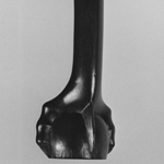 Fig. 15: Detail of a carved foot on the table in Fig. 14.